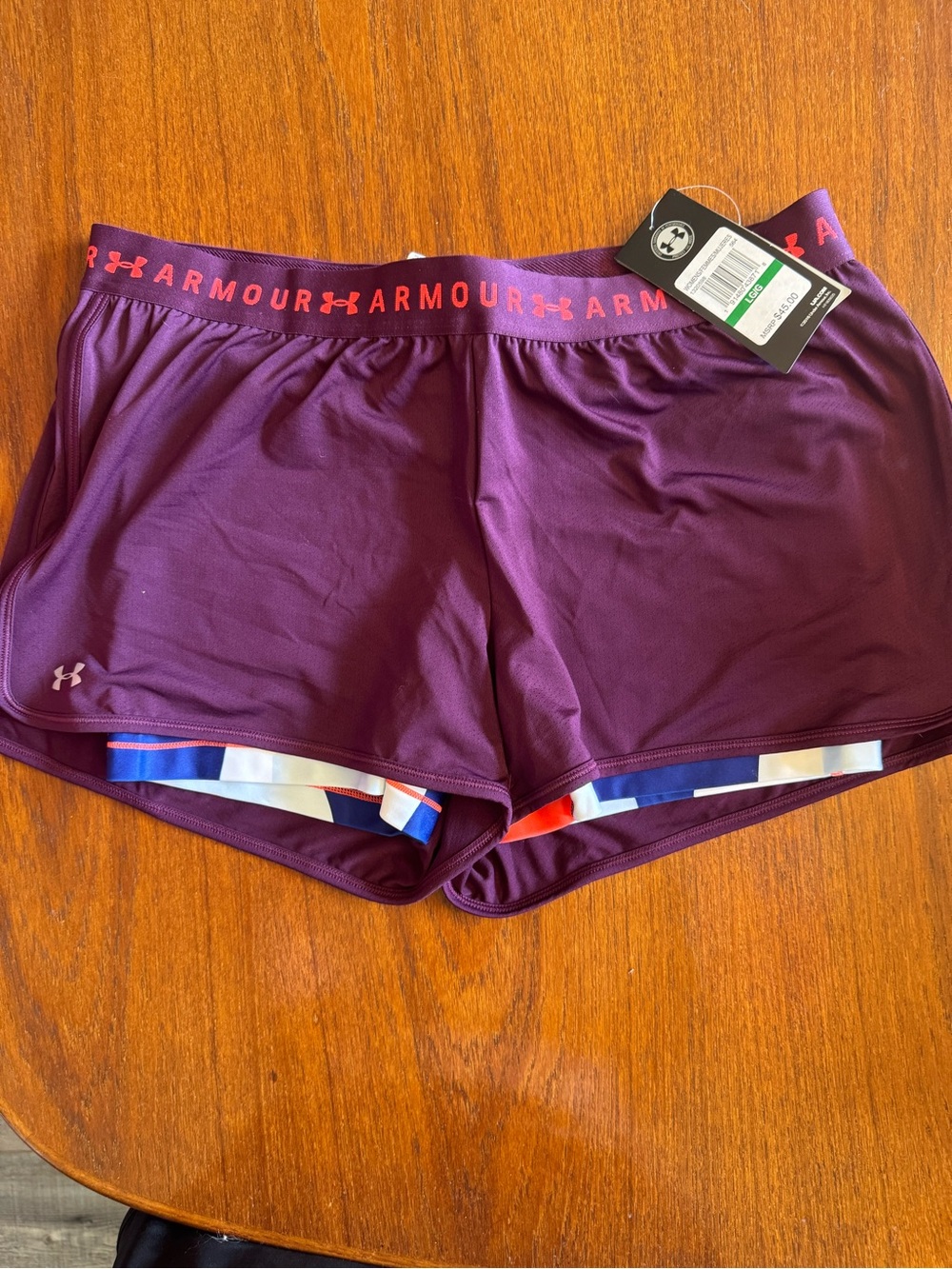 Under Armour Women's Maroon Layered Athletic Shorts with Coral Waistband